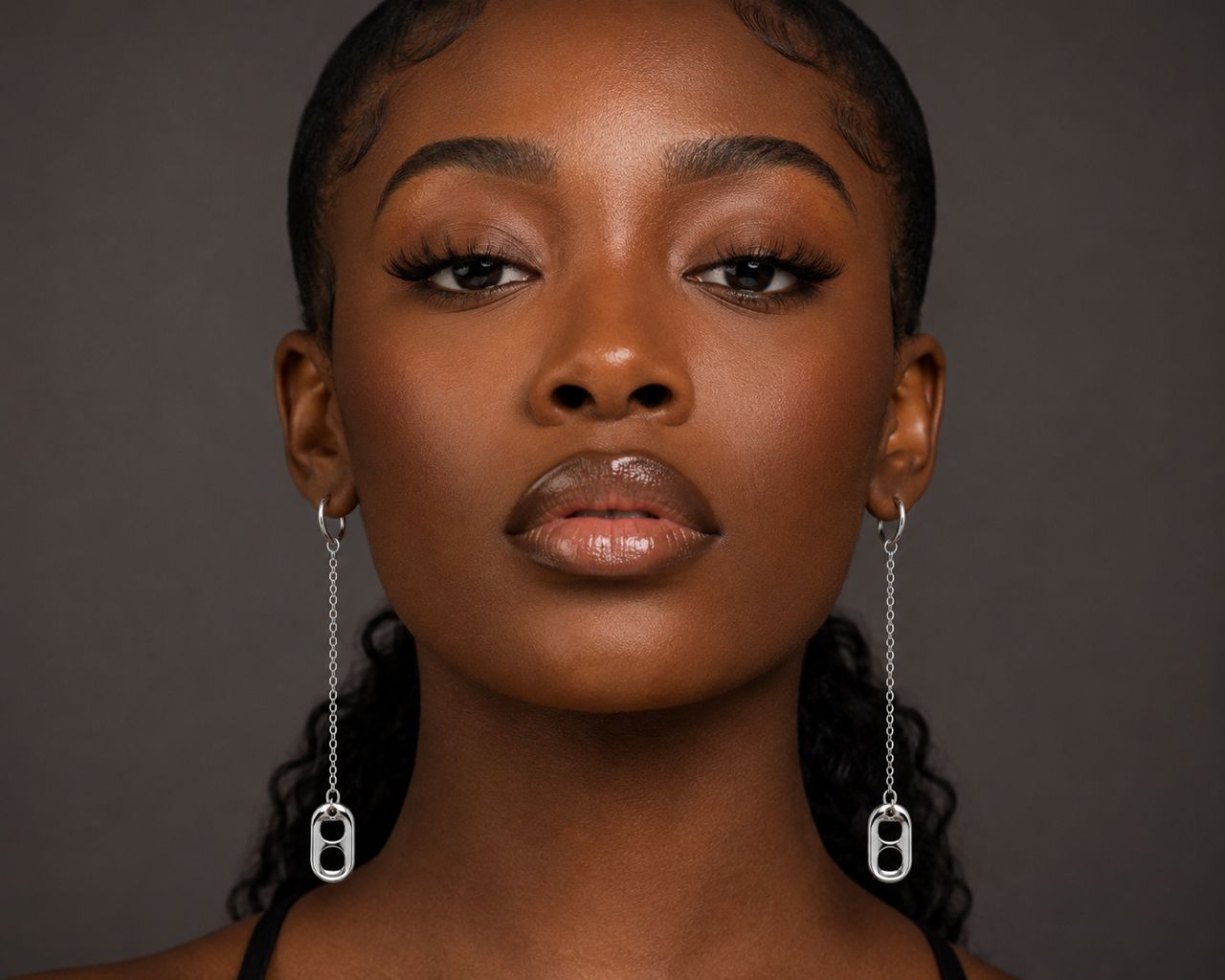 Woman with long drop earrings